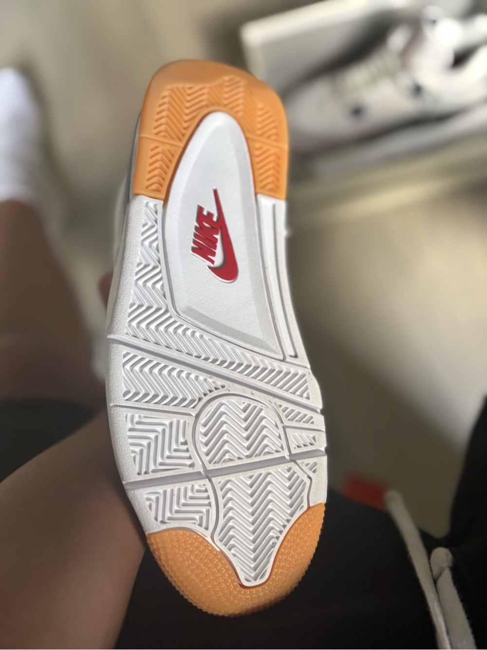 Nike Men’s White Sneakers with Orange Accents